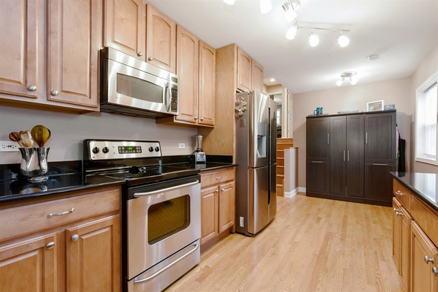 1425 Brummel Street Evanston, IL 60202 - Photo 5 of 24 a kitchen with stainless steel appliances granite countertop a refrigerator stove and sink