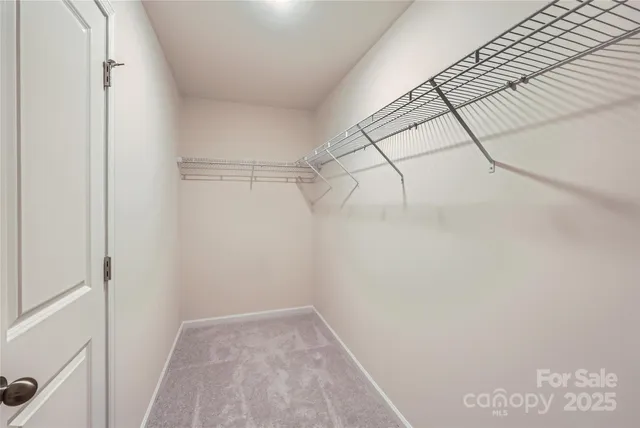 a view of a room with racks on the wall