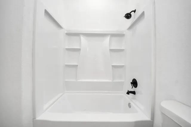 a bathroom with a bathtub