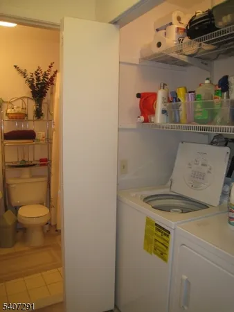 a bathroom with a toilet and a sink