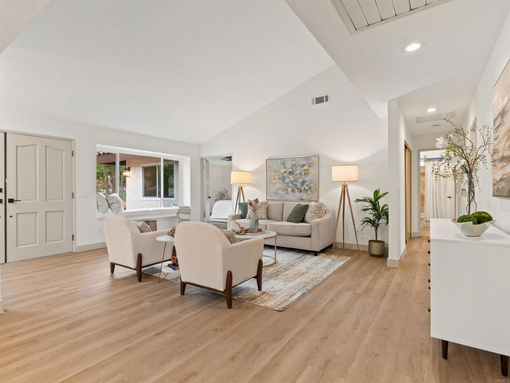 13737 Temple Street Poway, CA 92064 - Photo 7 of 38 a living room with furniture and a wooden floor