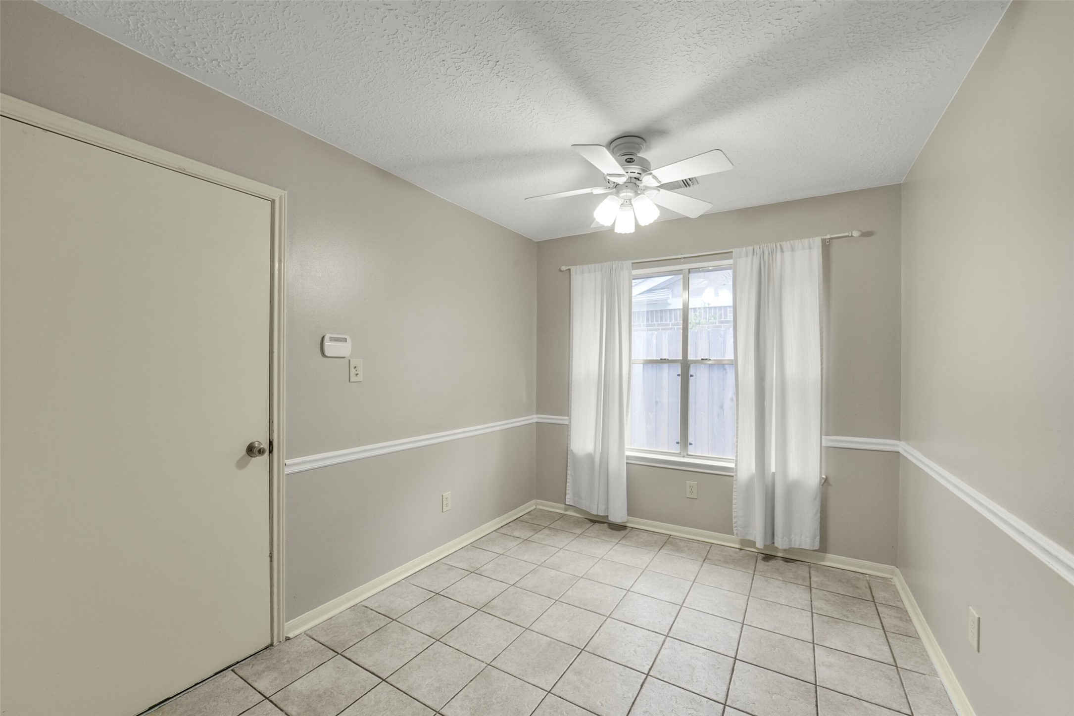 5539 Rivertree Lane Spring, TX 77379 - Photo 20 of 25 a view of an empty room with window