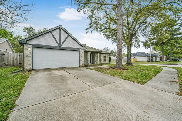 a house with trees in front of it