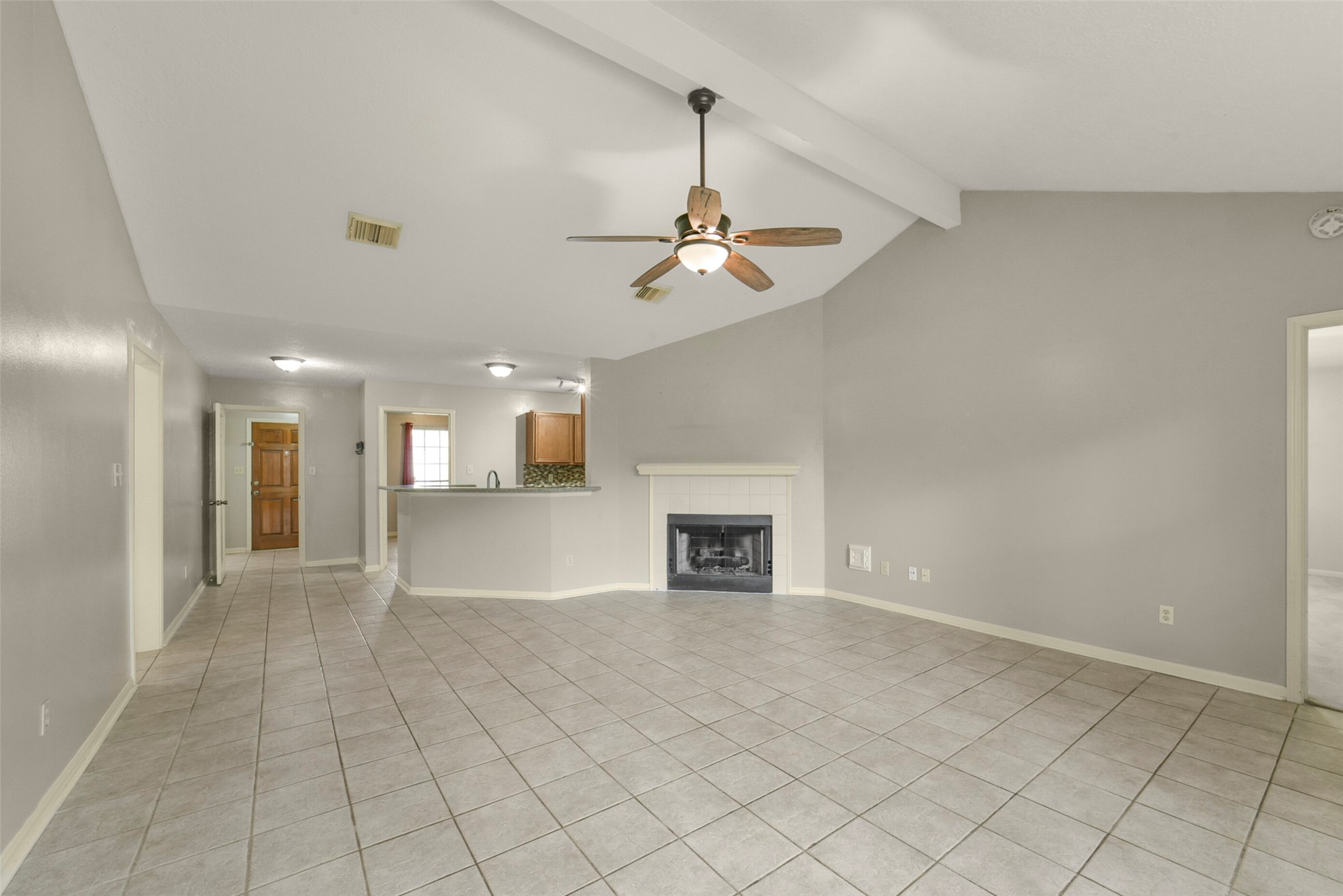 5539 Rivertree Lane Spring, TX 77379 - Photo 10 of 25 an empty room with fan and windows
