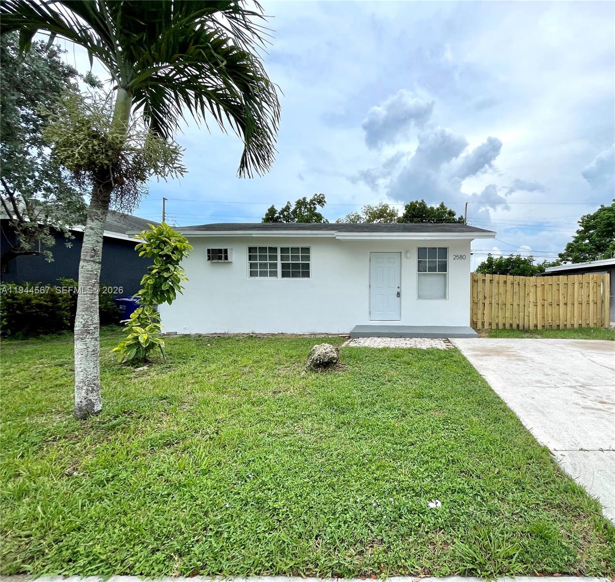 2580 Northwest 4th Court Pompano Beach, FL 33069 - Photo 1 of 10 a view of a house with a backyard