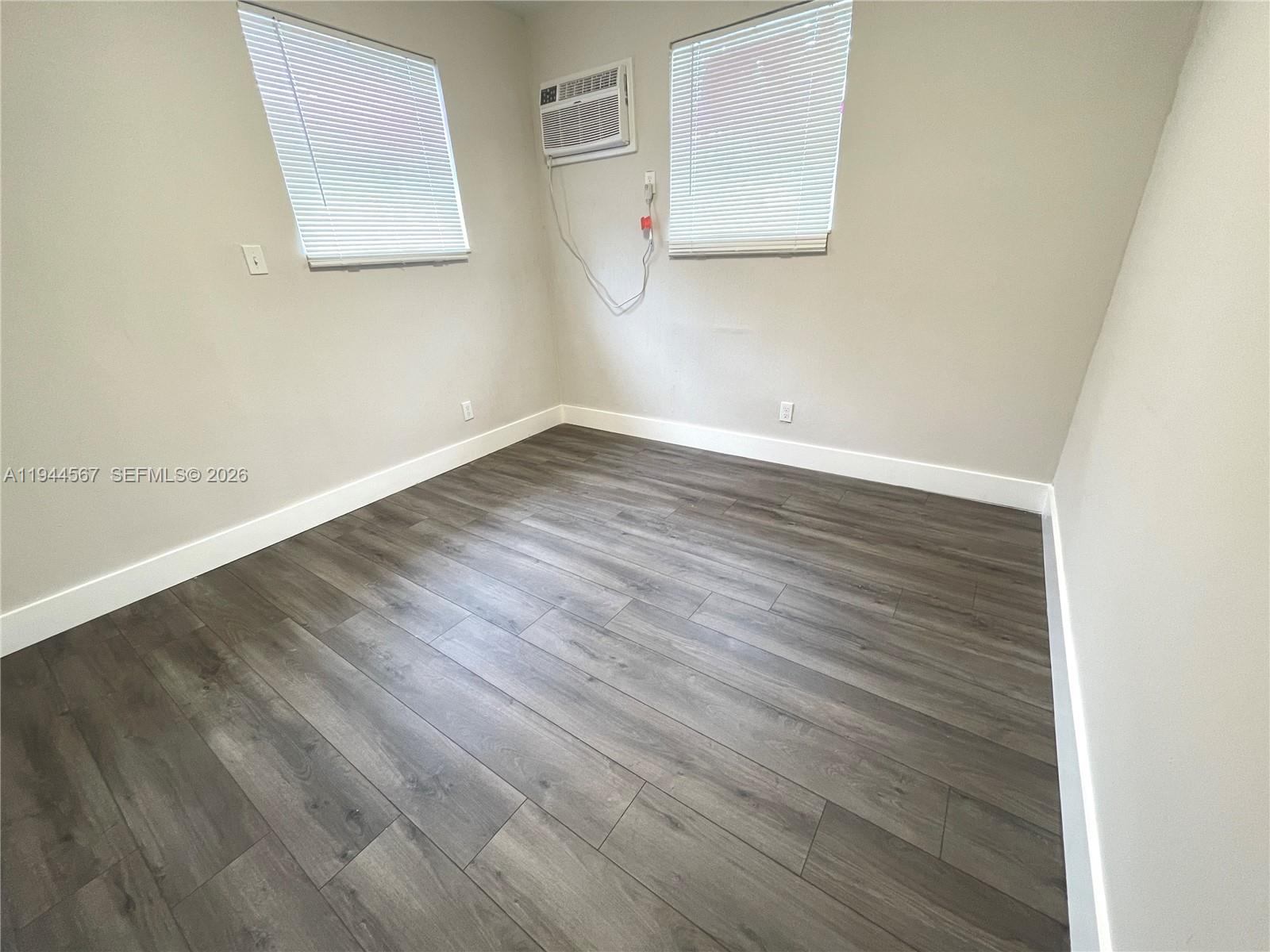 2580 Northwest 4th Court Pompano Beach, FL 33069 - Photo 9 of 10 wooden floor in a room