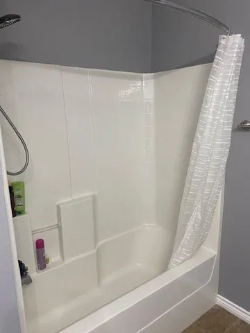 a bathroom with a bathtub