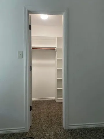 a view of a room with closet area