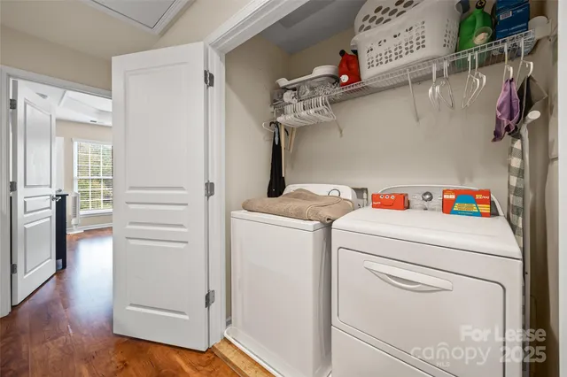 a spacious bedroom with a large bed and a large window