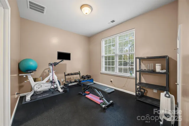 a view of a lounge chairs in the balcony