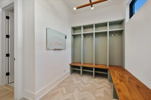 a bathroom with a double vanity sink and mirror