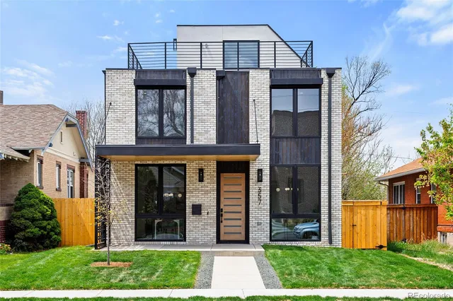 front view of a house with a yard