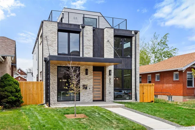 front view of a house with a yard