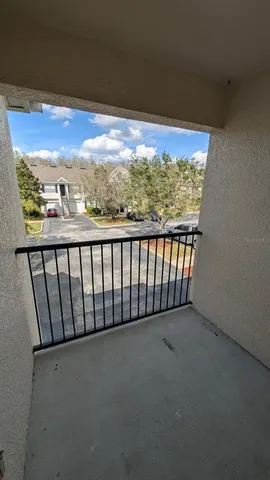 a view of swimming pool with outdoor seating