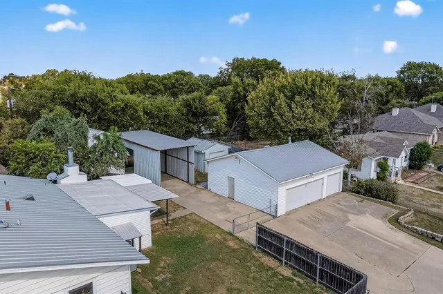 an aerial view of a house having yard