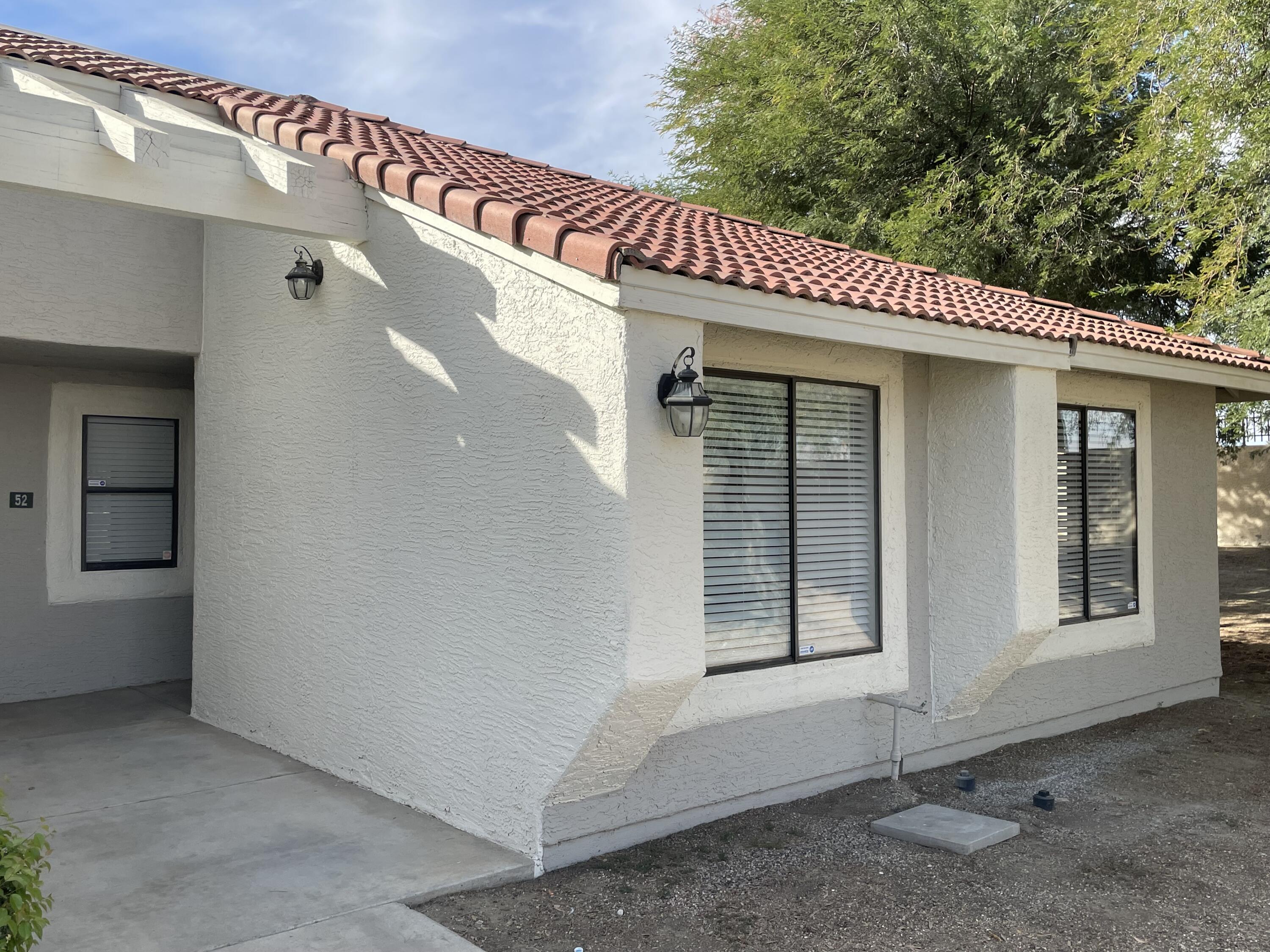 43376 Cook Street, Unit 52 Palm Desert, CA 92211 - Photo 1 of 42 a view of a house with a large window