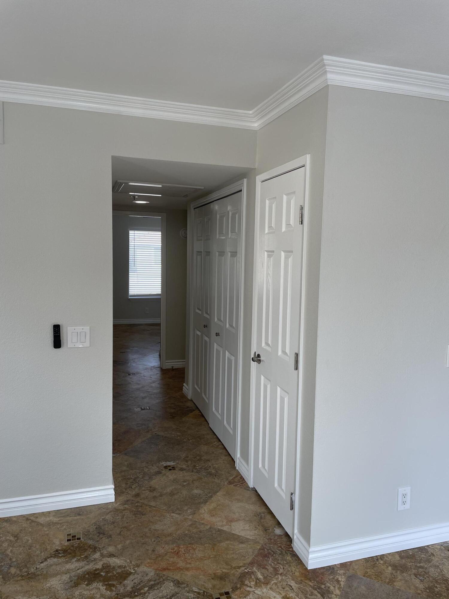 43376 Cook Street, Unit 52 Palm Desert, CA 92211 - Photo 12 of 42 a view of a hallway with wooden floor