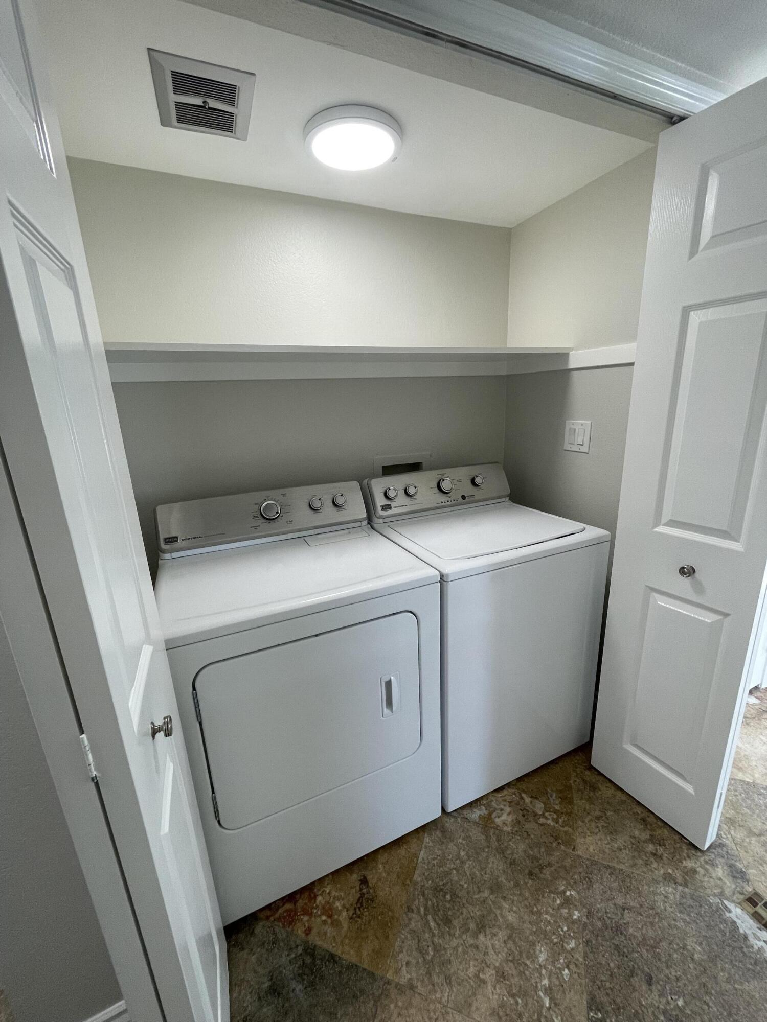 43376 Cook Street, Unit 52 Palm Desert, CA 92211 - Photo 23 of 42 a utility room with dryer and washer