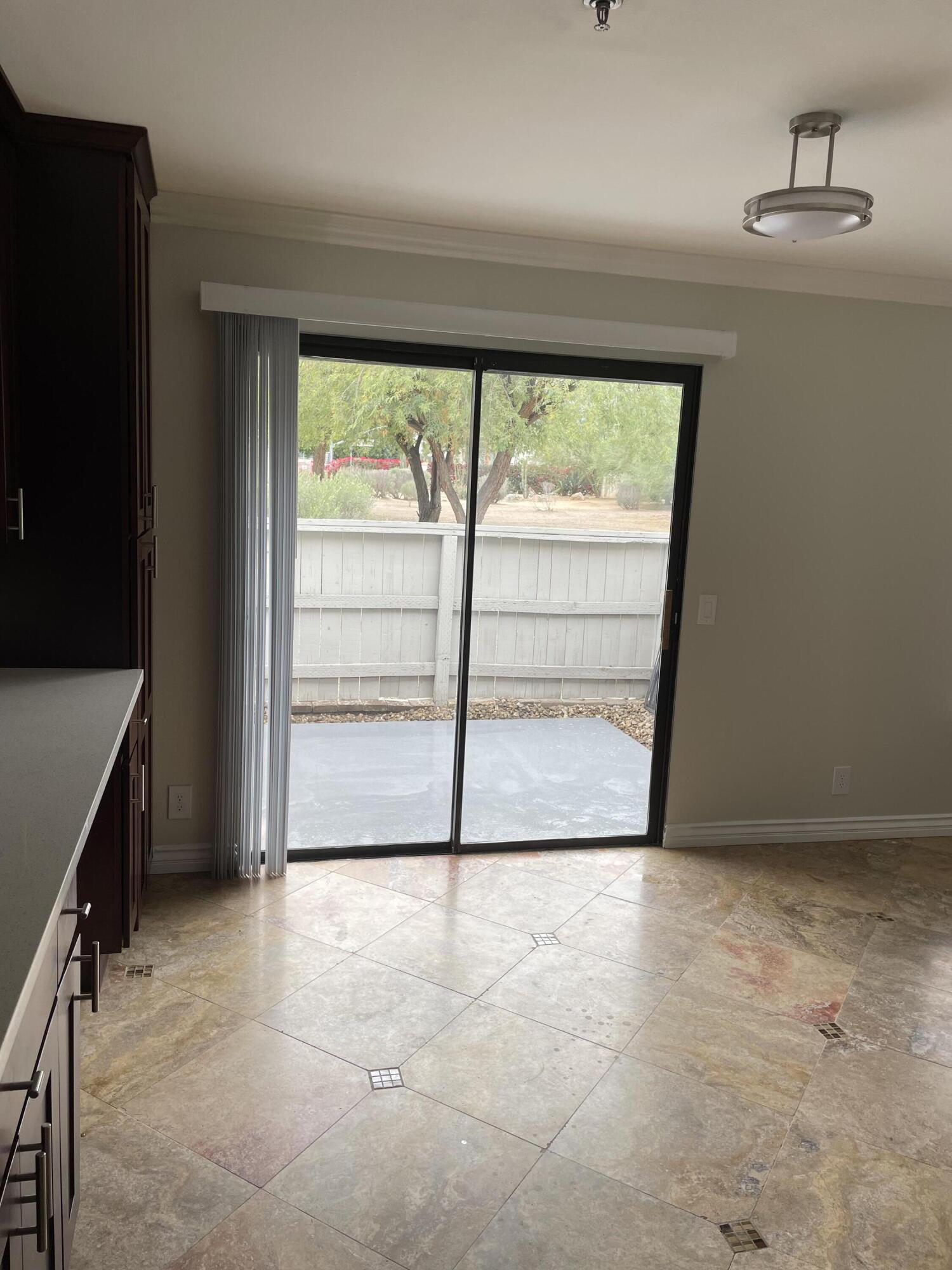 43376 Cook Street, Unit 52 Palm Desert, CA 92211 - Photo 25 of 42 a view of an empty room with a window