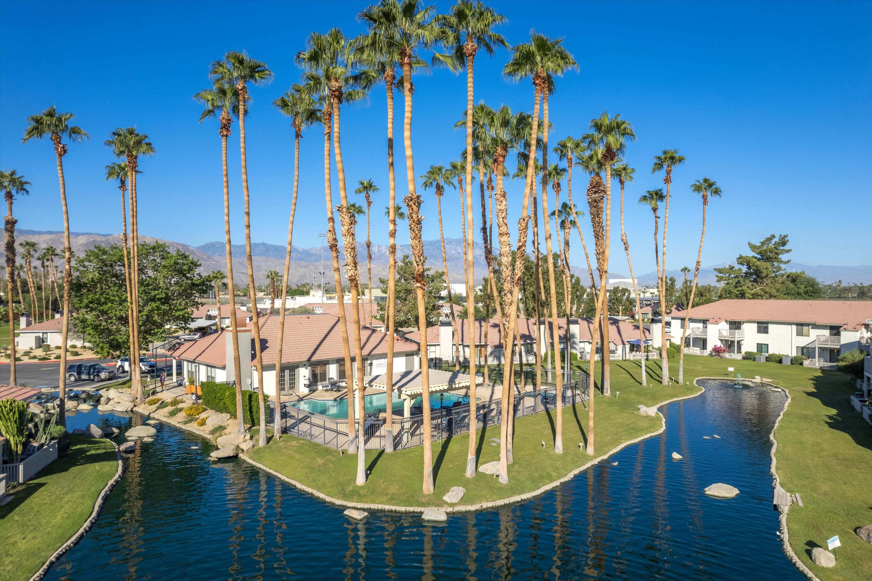 43376 Cook Street, Unit 52 Palm Desert, CA 92211 - Photo 36 of 42 a view of a lake with a ocean view