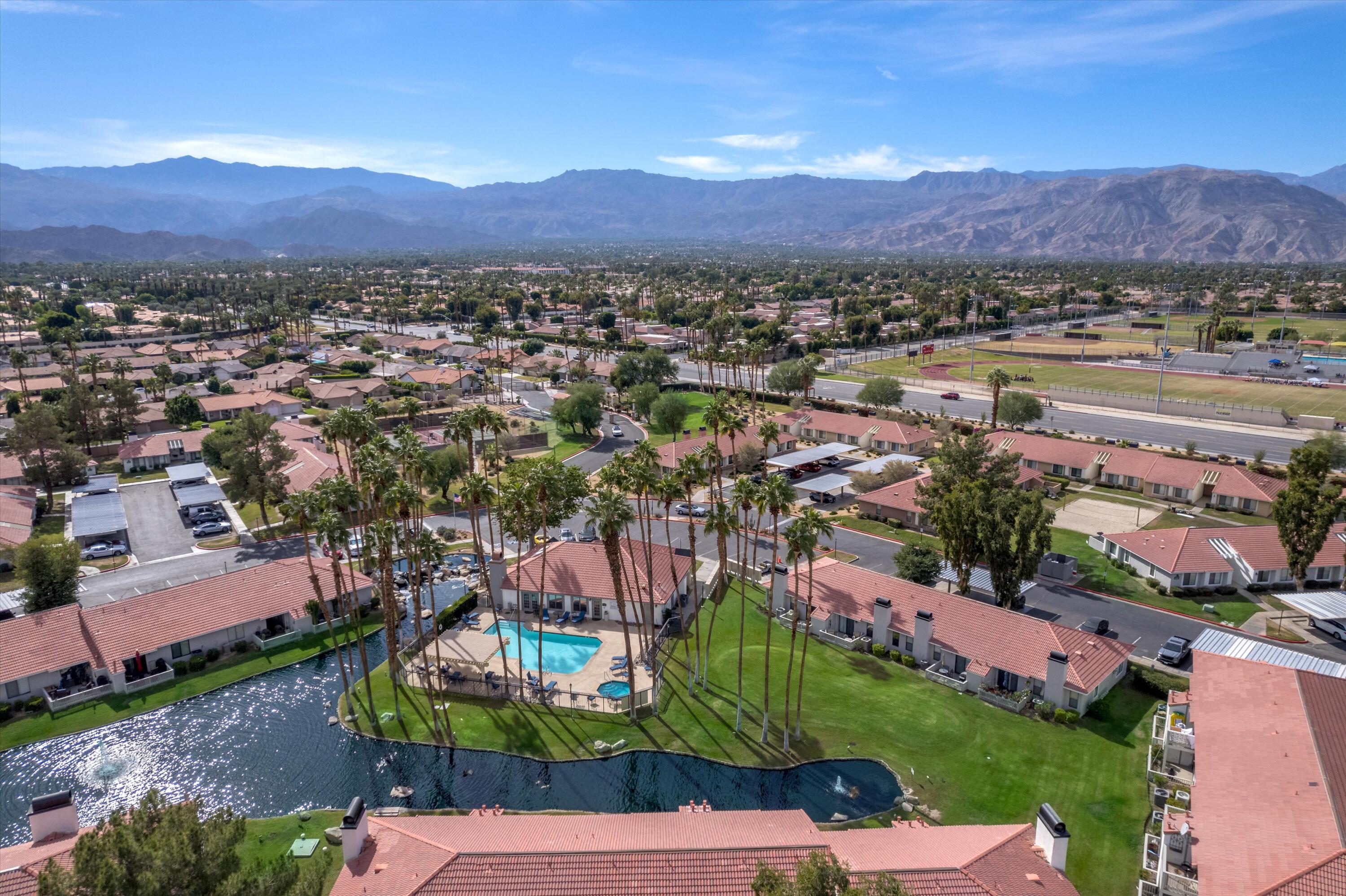 43376 Cook Street, Unit 52 Palm Desert, CA 92211 - Photo 40 of 42 a view of a city with a lake