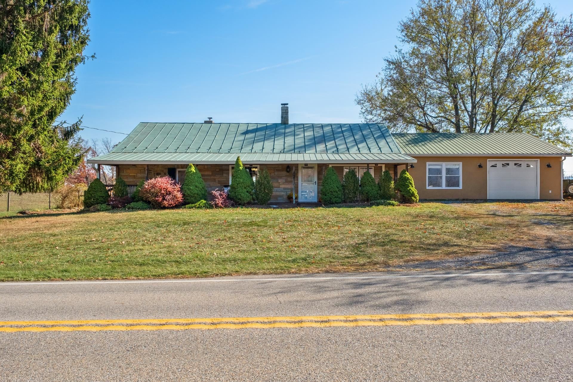 a front view of house with yard
