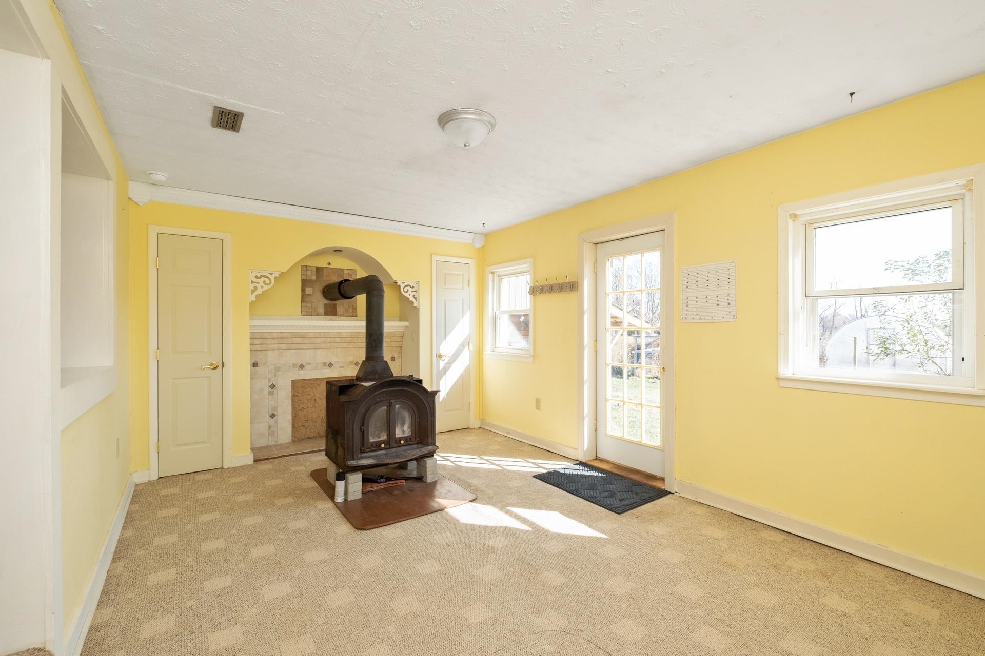 1426 Middlebrook Road Staunton, VA 24401 - Photo 13 of 45 a living room with fireplace furniture and a large window