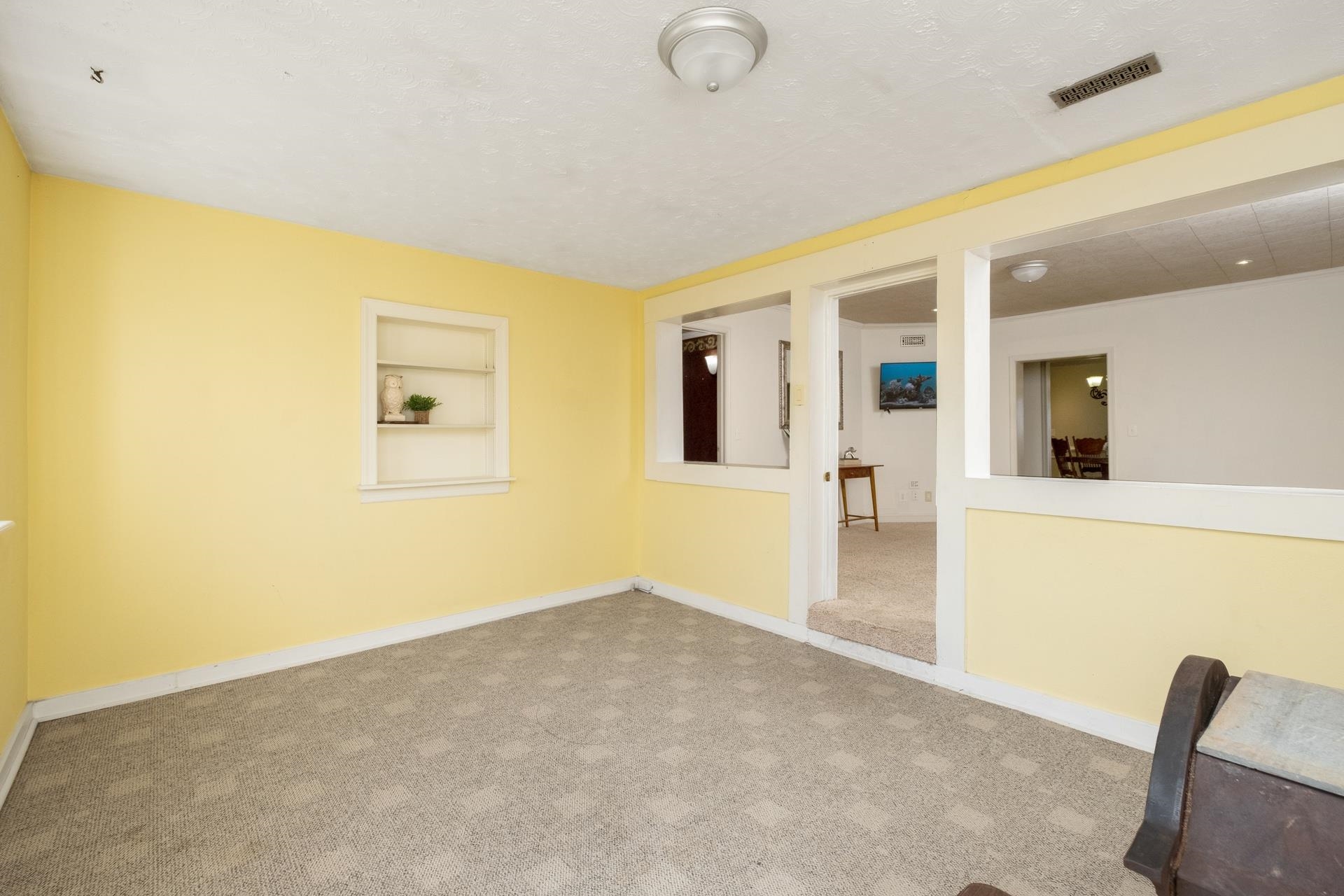 1426 Middlebrook Road Staunton, VA 24401 - Photo 15 of 45 a view of a livingroom with wooden floor and a ceiling fan