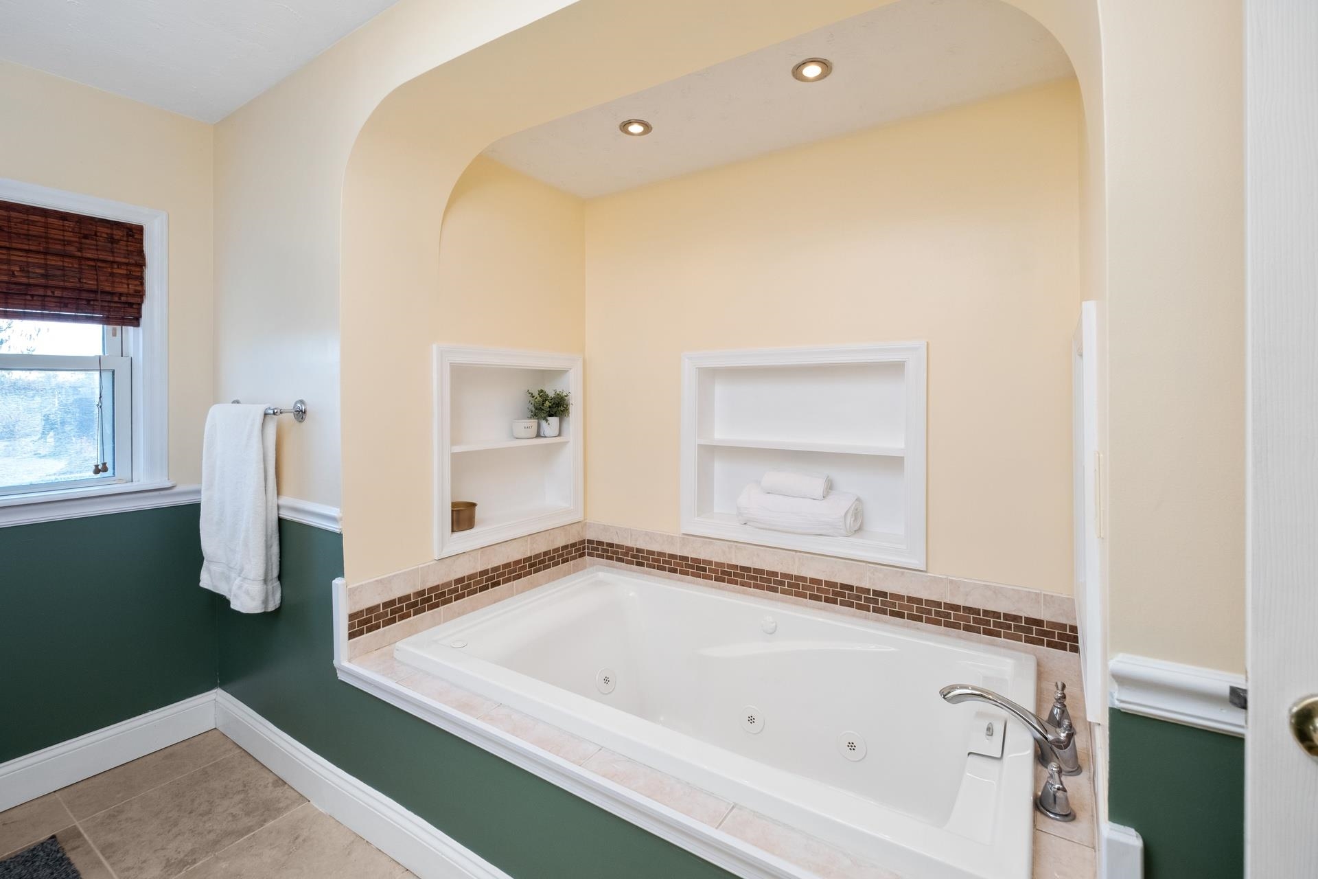 1426 Middlebrook Road Staunton, VA 24401 - Photo 25 of 45 a bathroom with a bathtub and a window