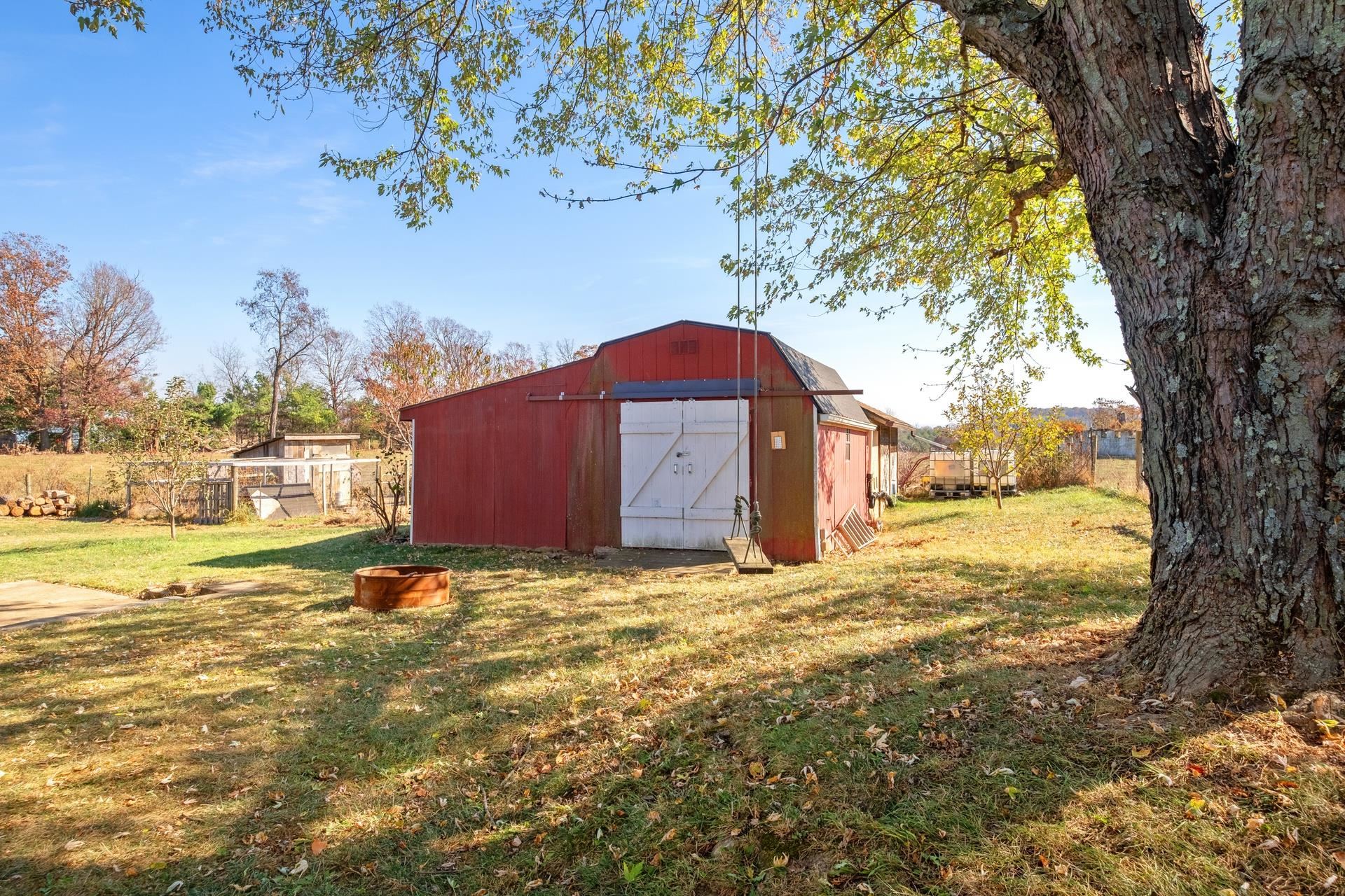 1426 Middlebrook Road Staunton, VA 24401 - Photo 35 of 45 a view of big yard with a tree