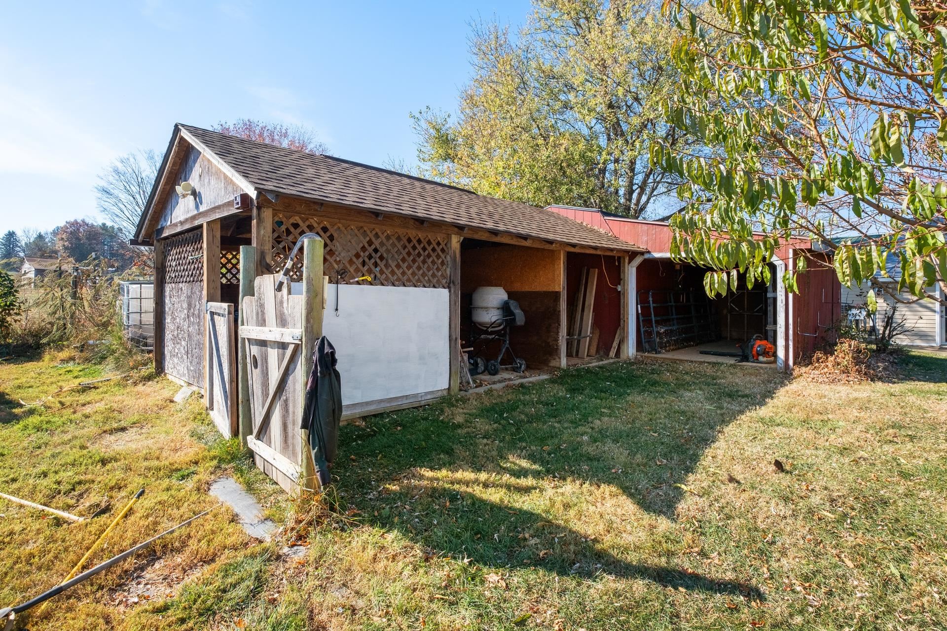 1426 Middlebrook Road Staunton, VA 24401 - Photo 36 of 45 a view of a house with a yard and large tree