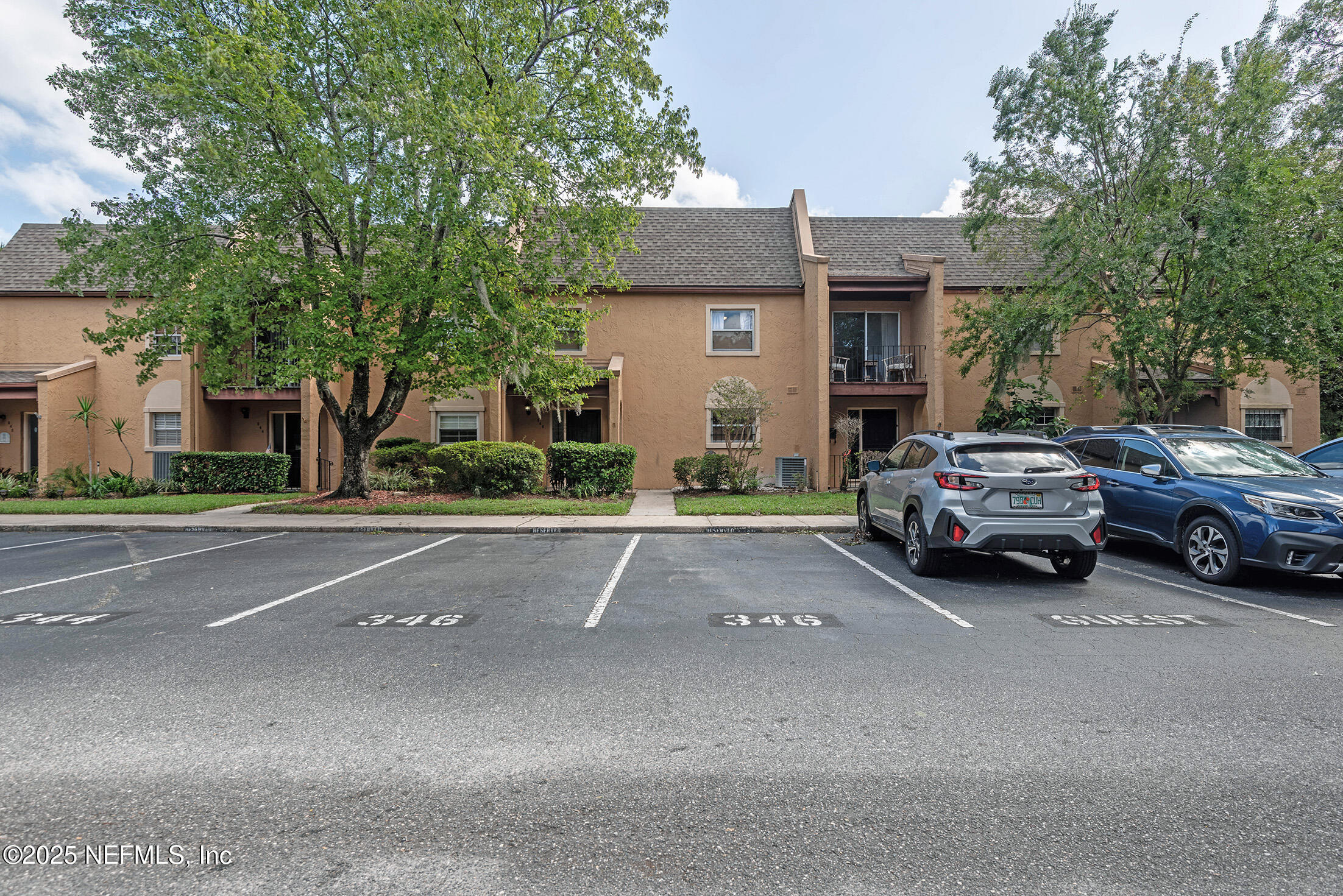 a car parked in front of a house