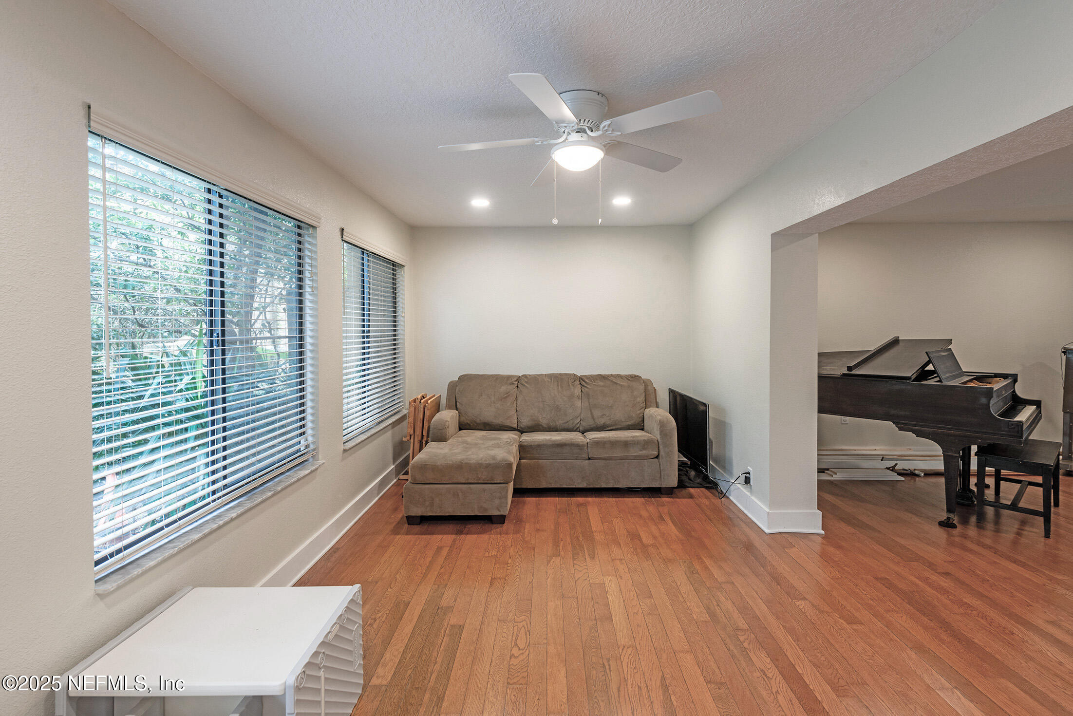 346 Raleigh Road, Unit 346 Jacksonville, FL 32225 - Photo 21 of 43 a living room with furniture and a wooden floor