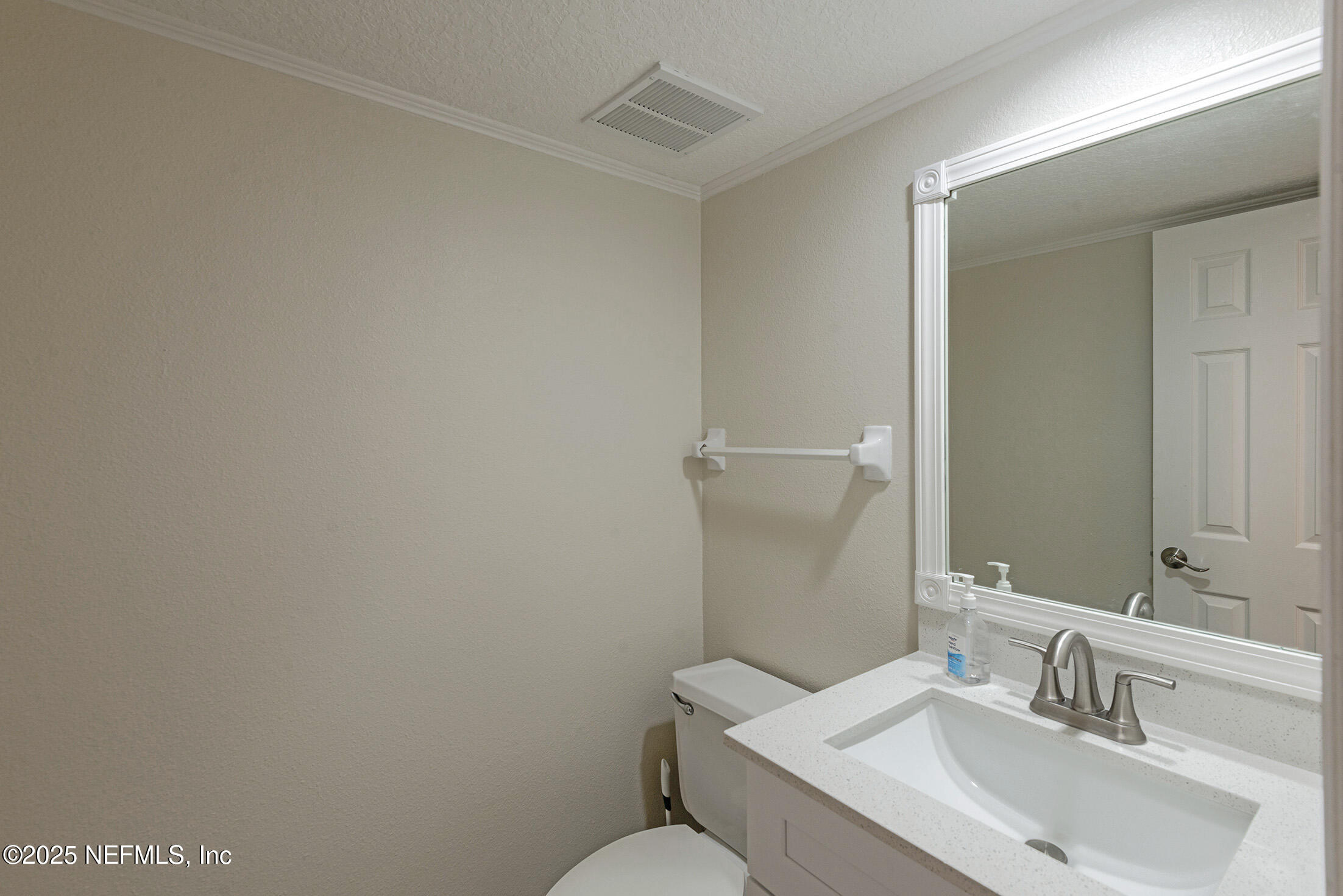 346 Raleigh Road, Unit 346 Jacksonville, FL 32225 - Photo 5 of 43 a bathroom with a sink and a toilet