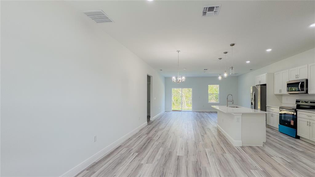 15625 Southwest 37th Circle Ocala, FL 34473 - Photo 2 of 27 a view of a kitchen and windows