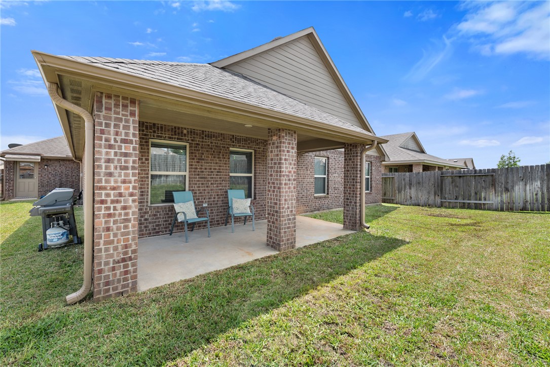 2018 Eagle View Drive Navasota, TX 77868 - Photo 25 of 28 a view of a house with a yard and furniture