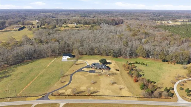 a kitchen with a stove and a refrigerator