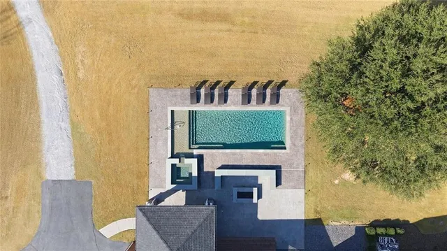 a kitchen with a sink stainless steel appliances and cabinets