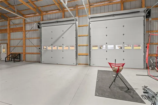 a living room with furniture a fireplace and a potted plant
