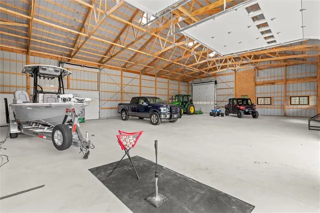 a view of a dining room with furniture wooden floor and chandelier