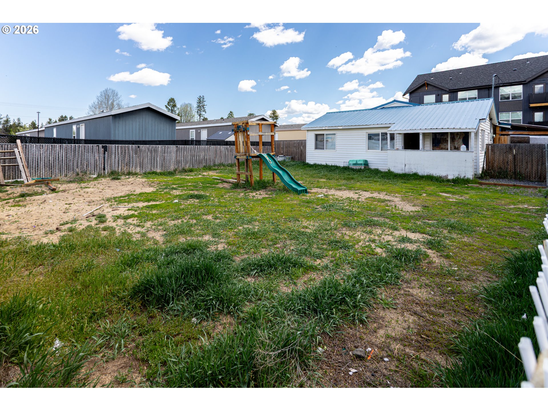 51380 Preble Way La Pine, OR 97739 - Photo 1 of 26 a view of a house with a backyard and a patio