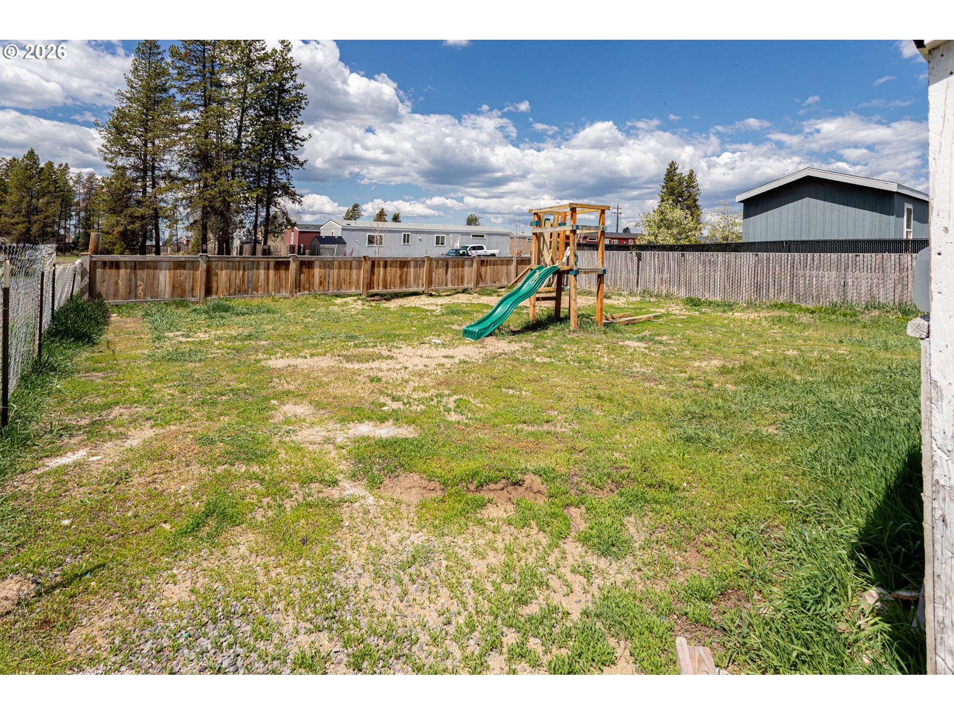 51380 Preble Way La Pine, OR 97739 - Photo 19 of 26 a view of a yard with a swimming pool