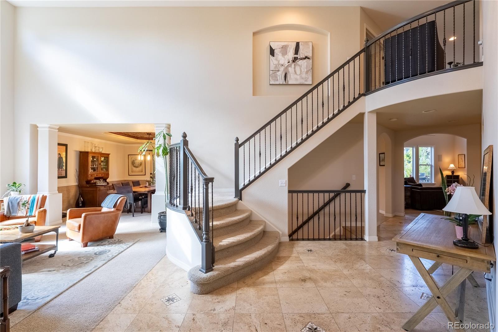 3822 Broadmoor Loop Broomfield, CO 80023 - Photo 11 of 50 a view of staircase with living room