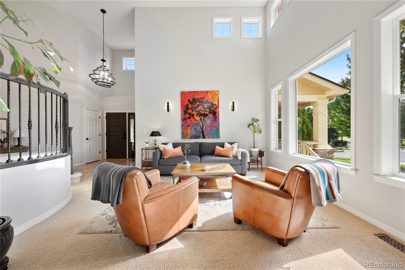 3822 Broadmoor Loop Broomfield, CO 80023 - Photo 13 of 50 a living room with furniture ceiling fan and a window