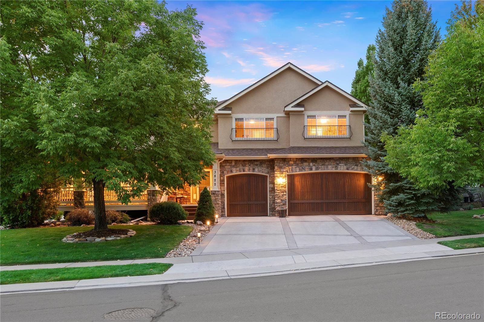 3822 Broadmoor Loop Broomfield, CO 80023 - Photo 3 of 50 a front view of a house with a yard and garage