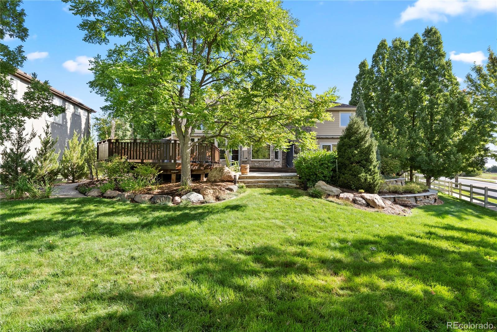 3822 Broadmoor Loop Broomfield, CO 80023 - Photo 39 of 50 a view of a park with large trees