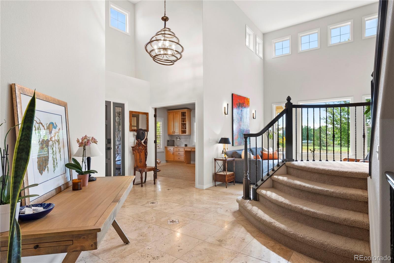 3822 Broadmoor Loop Broomfield, CO 80023 - Photo 10 of 50 a view of entryway with livingroom and furniture
