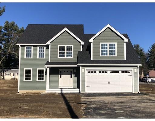 80 Whipple Road Billerica, MA 01821 - Photo 1 of 19 a front view of a house with a yard