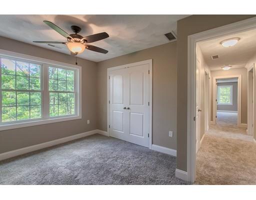 80 Whipple Road Billerica, MA 01821 - Photo 14 of 19 a view of empty room with window and ceiling fan