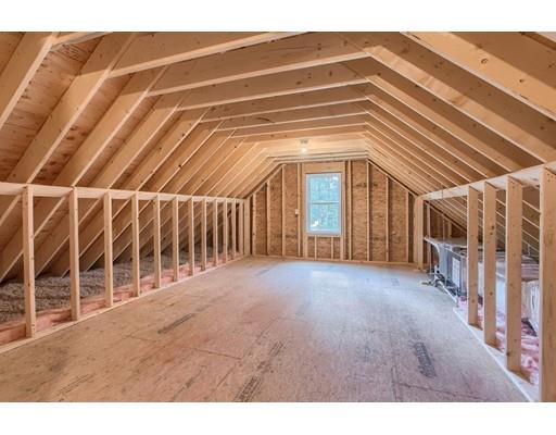 80 Whipple Road Billerica, MA 01821 - Photo 16 of 19 a view of an empty room with wooden floor